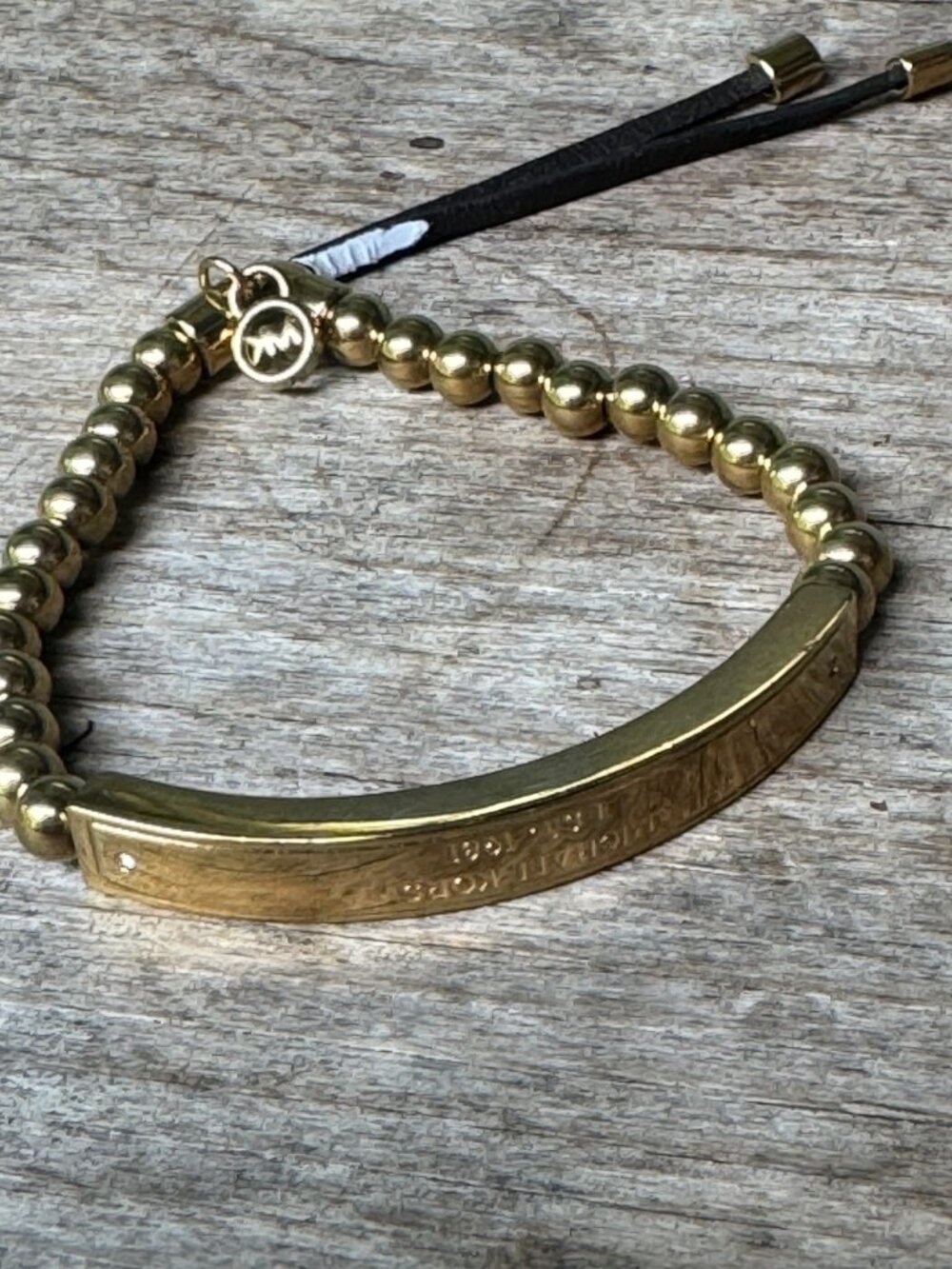 Michael Kors Bracelet Gold Tone Beaded With Engraved Bar And Adjustable Cord